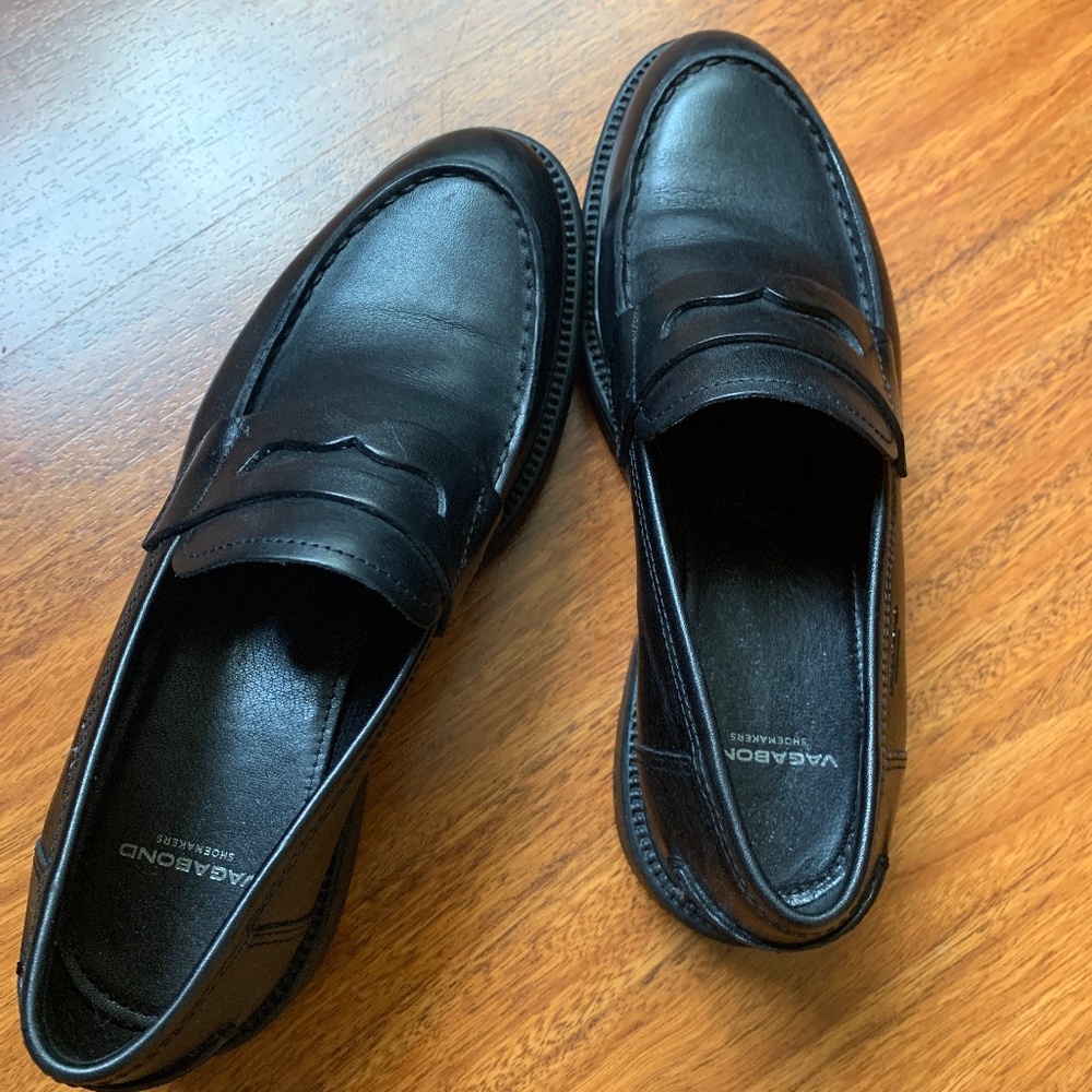 Black polished leather loafers